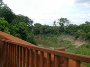 The view of the Trinity River from the River Legacy Trail bridge