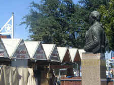 Davy Crockett looking over a Frito Pie booth at the State Fair of Texas.