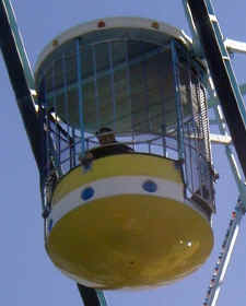 An extreme close up of a Texas Star Gondola at the Texas State Fair.