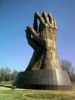 Praying hands sculpture at Oral Roberts University.