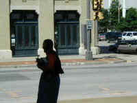 A street preacher testifying to his flock in downtown Fort Worth.